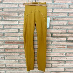 NWT Lululemon Unlimit HR Tight Leggings 25” Size 2 Gold Spice Yellow Mustard